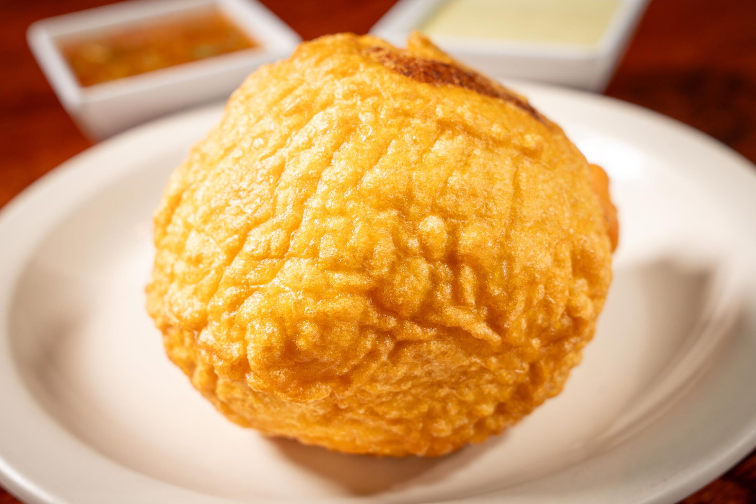 Crispy stuffed mashed potato ball with shredded beef, rice, and vegetables at America's Bakery and Restaurant in Davie, FL.